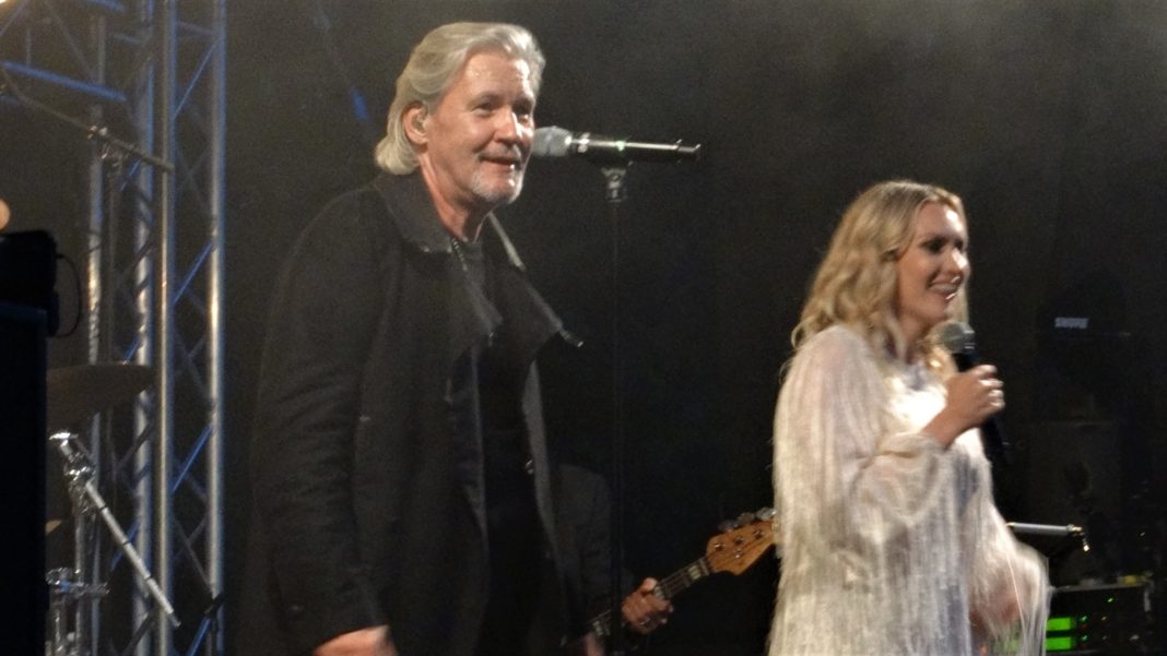 Johnny Logan and Jannike performing